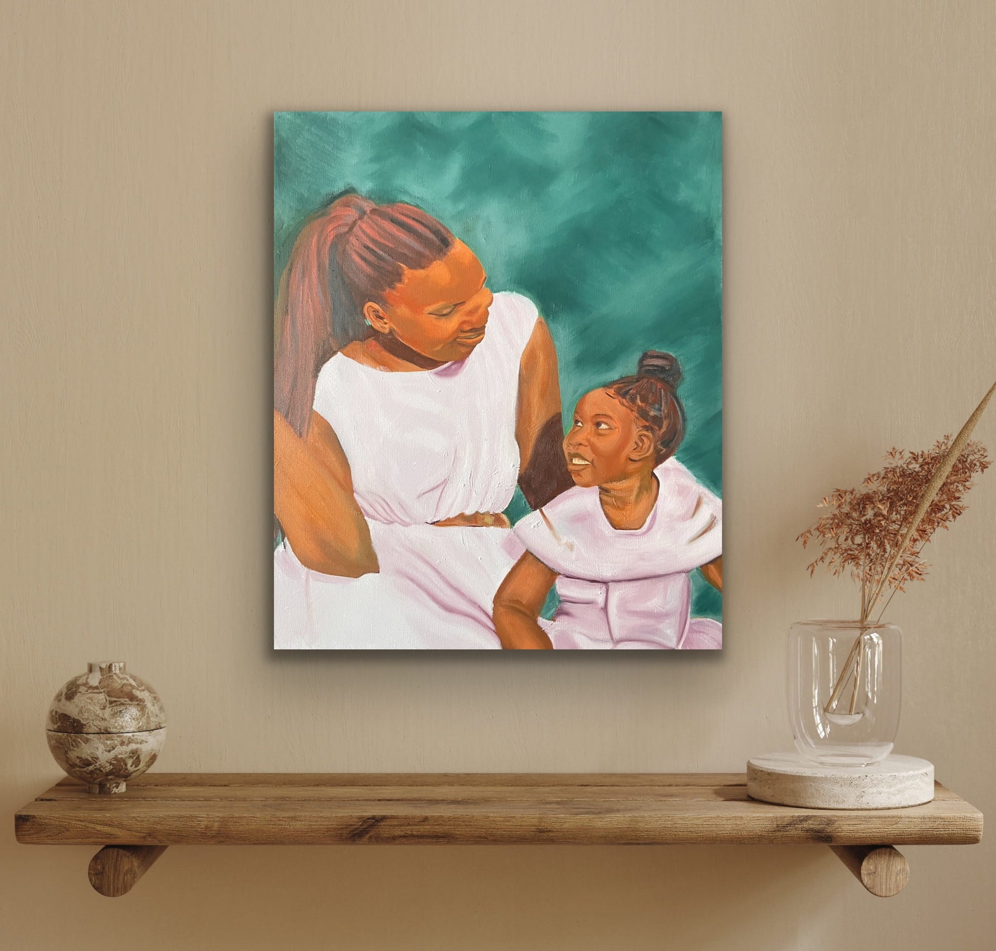 Mother and daughter smiling at each other on green background