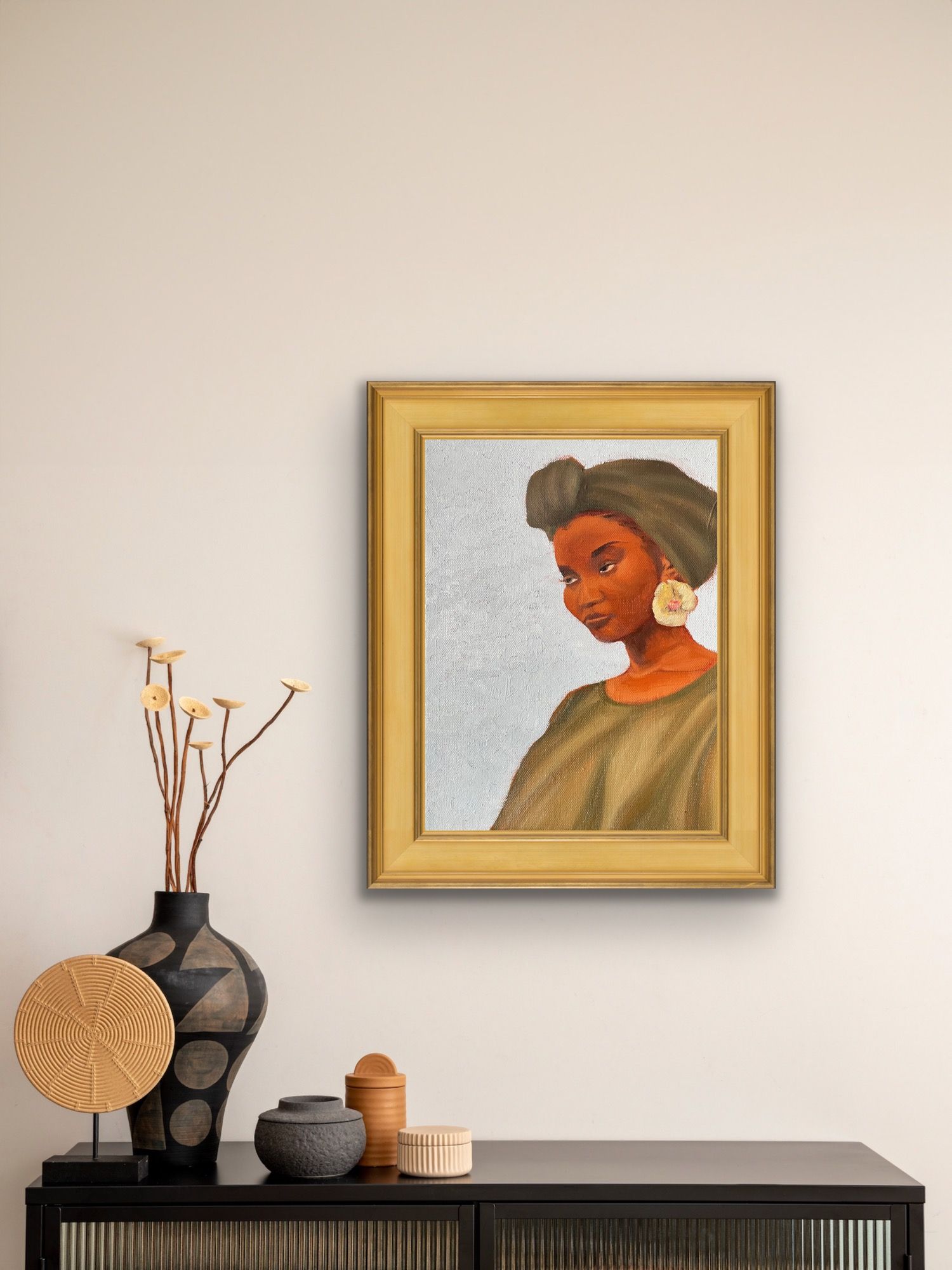 Rock oil painting of woman with green headwrap, dress and flower earring